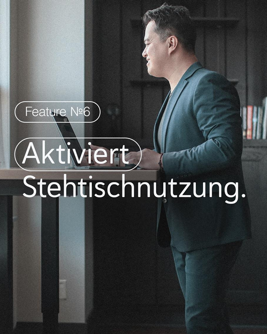 Isa Gesundheitscoach steht auf dem Schreibtisch und zeigt welche körperlichen Übungen man machen sollte.