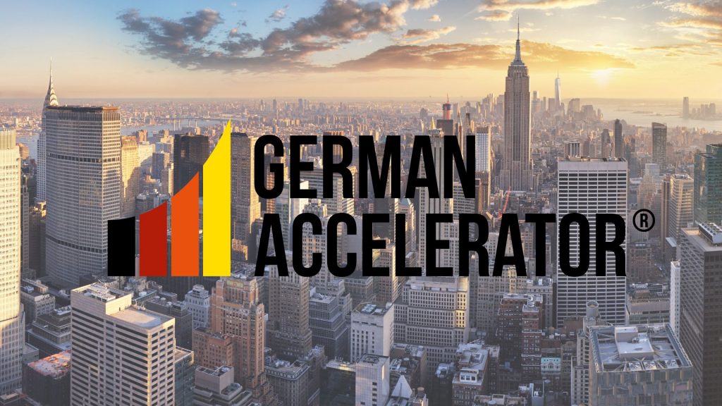 Das Bild zeigt das Logo des German Accelerator Program. Der Hintergrund zeigt New York.